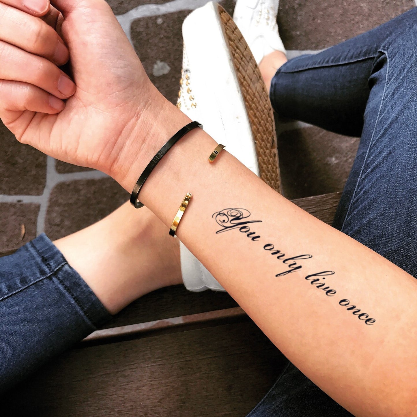 fake medium you only live once lettering temporary tattoo sticker design idea on forearm