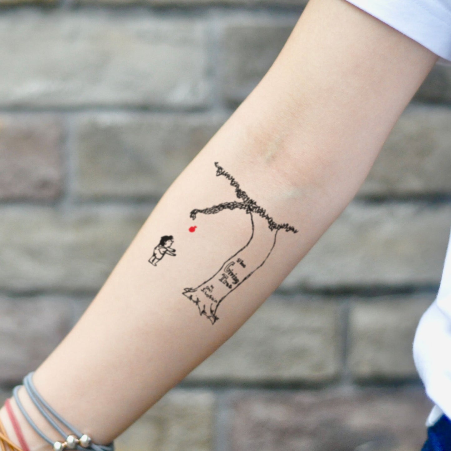fake small the giving tree illustrative temporary tattoo sticker design idea on inner arm