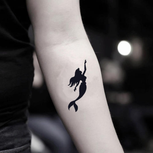 fake small ariel shadow cartoon temporary tattoo sticker design idea on inner arm