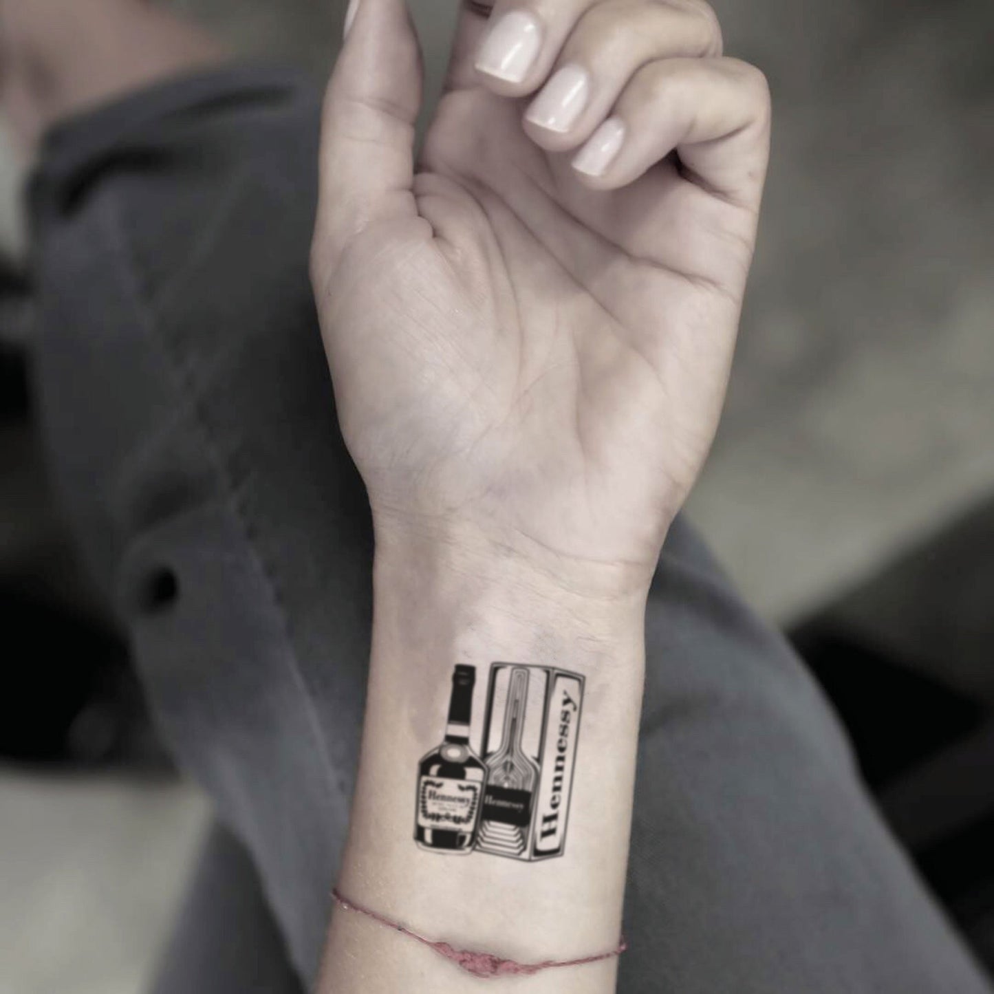 fake small hennessy bottle food temporary tattoo sticker design idea on wrist